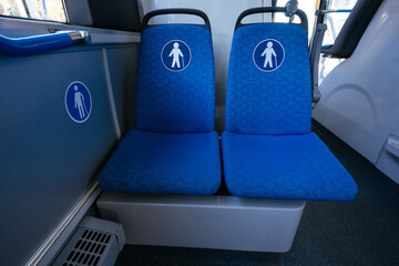 Seats for old or disabled people in modern bus