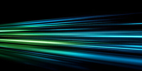 Blue and green horizontal light trails on dark background, speed and motion effect design
