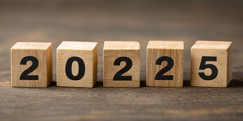 Transitioning from 2025 to 2026 with wooden blocks. 