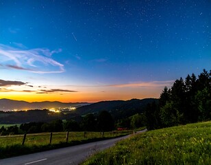 Fototapeta premium Starry night landscape over a road