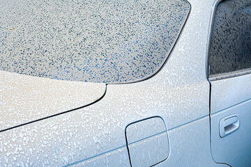 The first drops of water reach the surface of a dirty car requiring washing and cleaning, leading to corrosion and vehicle diagnostics at a service center