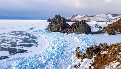 Frozen lake with rocky outcrop