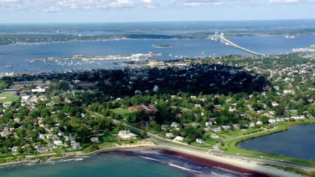 Aerial view of newport, rhode island, showcasing its coastline and bridge