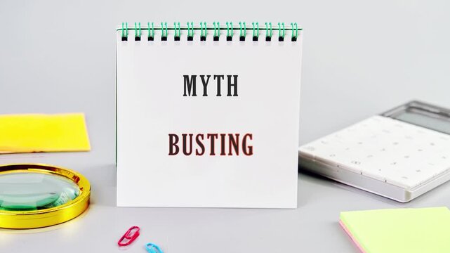 Animation of the MYTH BUSTING concept text on White blank notebook.. Information concept