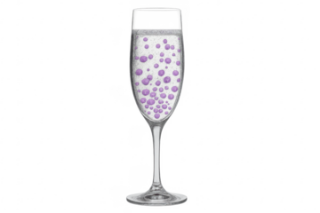 Champagne flute holding liquid with purple bubbles