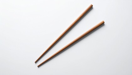 Elegant wooden chopsticks neatly arranged on a pristine white background, showcasing traditional Asian dining utensils for culinary experiences and minimalist design