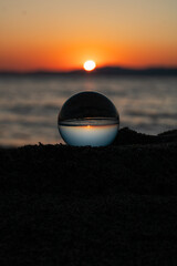 Crystal Ball Sunset at Sea, Lensball and Sunset on Sand