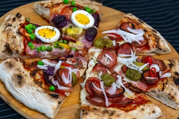 The most acclaimed, traditional and popular Brazilian pizza, half pepperoni calabresa and half Portuguese