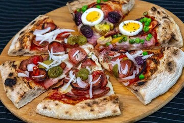 The most acclaimed, traditional and popular Brazilian pizza, half pepperoni calabresa and half Portuguese