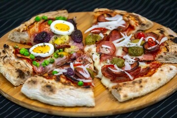 The most acclaimed, traditional and popular Brazilian pizza, half pepperoni calabresa and half Portuguese