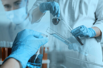 Laboratory analysis. Scientists working with glassware, multiple exposure