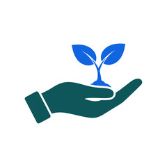 Hand holding small plant seedling in cupped palm against white backdrop symbolizes growth and environmental stewardship.