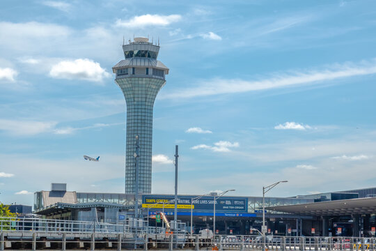 Chicago, Illinois, USA. Sep 25, 2025. A dynamic wide-angle view of Chicago O'Hare (ORD) control tower, its modern concrete and glass architecture commanding the busy airfield.