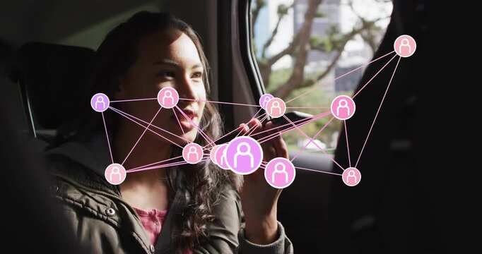 Car passenger pressing phone button sending voice data as icons branching into pulsating IT network