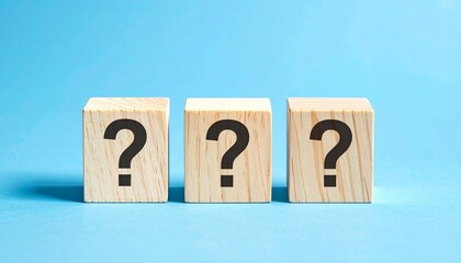 Three upright wooden blocks with black question marks on a light blue background, evenly spaced in a row, symbolizing inquiry, uncertainty, and the search for answers in a minimal visual.