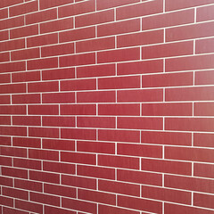 red brick wall texture or background, close-up with distorted proportions