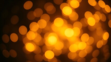 Obraz premium Golden bokeh light circles creating a dreamy and festive atmosphere with soft gradients.