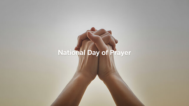 Hands clasped in prayer against a soft gradient background with text 'National Day of Prayer'