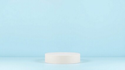 Minimalist white podium on a soft blue background for product display