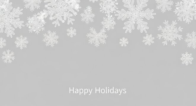 Elegant holiday season backdrop featuring delicate white snowflakes on gray background