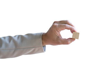 Businessman holding a piece of blank square wood block. Isolated on transparent background.