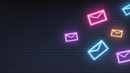 Neon Email Symbols on Dark Brick Wall