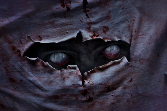 Scary zombie eyes peeking, Halloween theme