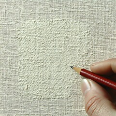 Hand holding red pencil over textured canvas