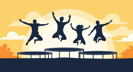 Obraz premium Silhouette of a group of people jumping on trampolines during sunset.