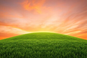 Vibrant green rolling hill under a dramatic orange sunset sky