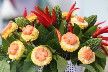 Flower vase made from vegetables and fruits