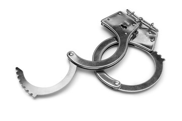 Metal handcuffs on grey background, closeup
