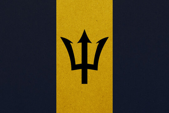 The vibrant flag of Barbados showcases a rich cultural heritage and national identity through its bold colors and central trident emblem, symbolizing a break from colonial past to