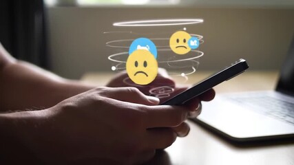 Person Using Smartphone with Animated Social Media Emojis and Communication Icons - Powered by Adobe