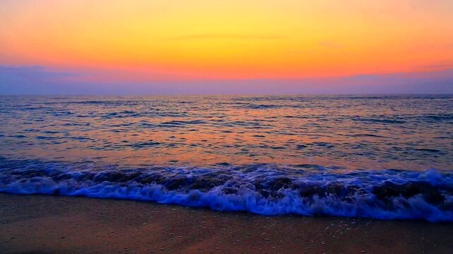 Beautiful summer sunrise over the beach