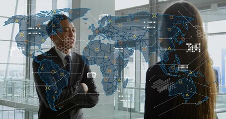Data icons filling map overlay initiating businessman gesturing world market, colleague listening - Powered by Adobe