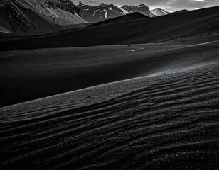 Black And White Desert Landscape Under Dramatic Sky