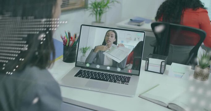 User leaning in remote meeting while presenter tearing sheet and marking sections with code overlay