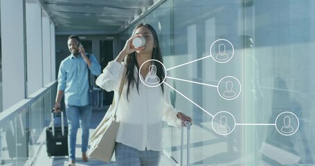 Woman stepping onto airport jet bridge boarding while sipping coffee and man trailing calling phone - Powered by Adobe