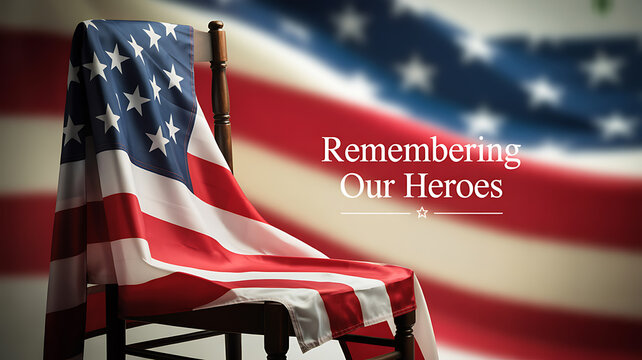 American flag draped over a chair with text 'Remembering Our Heroes' against a blurred flag background