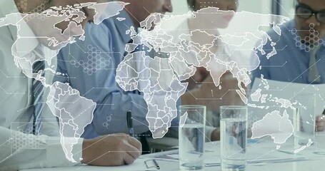 Business professionals leaning forward reviewing charts as world map expanding, showing global data - Powered by Adobe