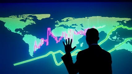 Global market data displayed on a large screen with a person reviewing the information - Powered by Adobe
