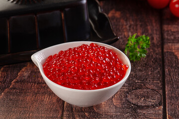 Salmon red caviar in the bowl