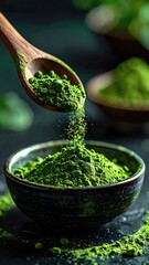 Close-up of green powder, likely matcha, being poured from a wooden spoon into a bowl