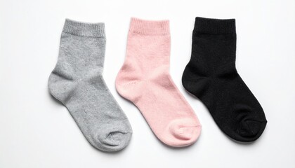 Three pairs of socks in grey, pink, and black