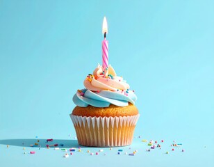 Festive cupcake with a lit candle