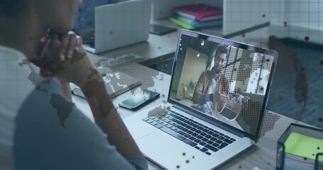 Businesswoman resting chin during call, digital map showing links as colleague flipping docs - Powered by Adobe