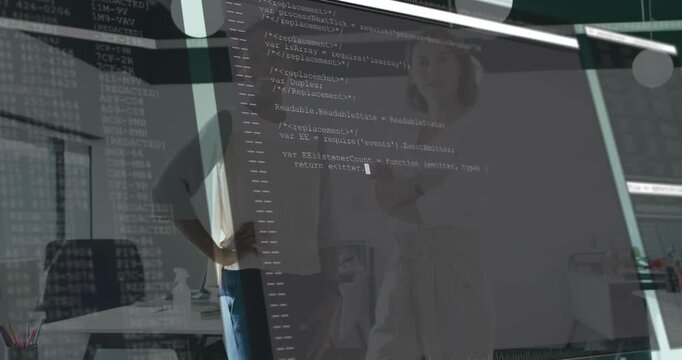 Two women standing in tech office smiling upon translucent code overlay fading and scrolling down