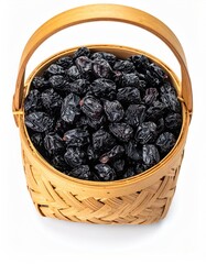 Dried black fruits in a woven basket