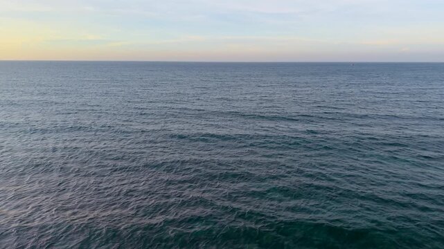 Aerial drone view of over tropical sea waves. Royalty high-quality free best stock of beautiful wave calm, blue water surface background for rest relax on vacation, journey, trip. Turquoise background